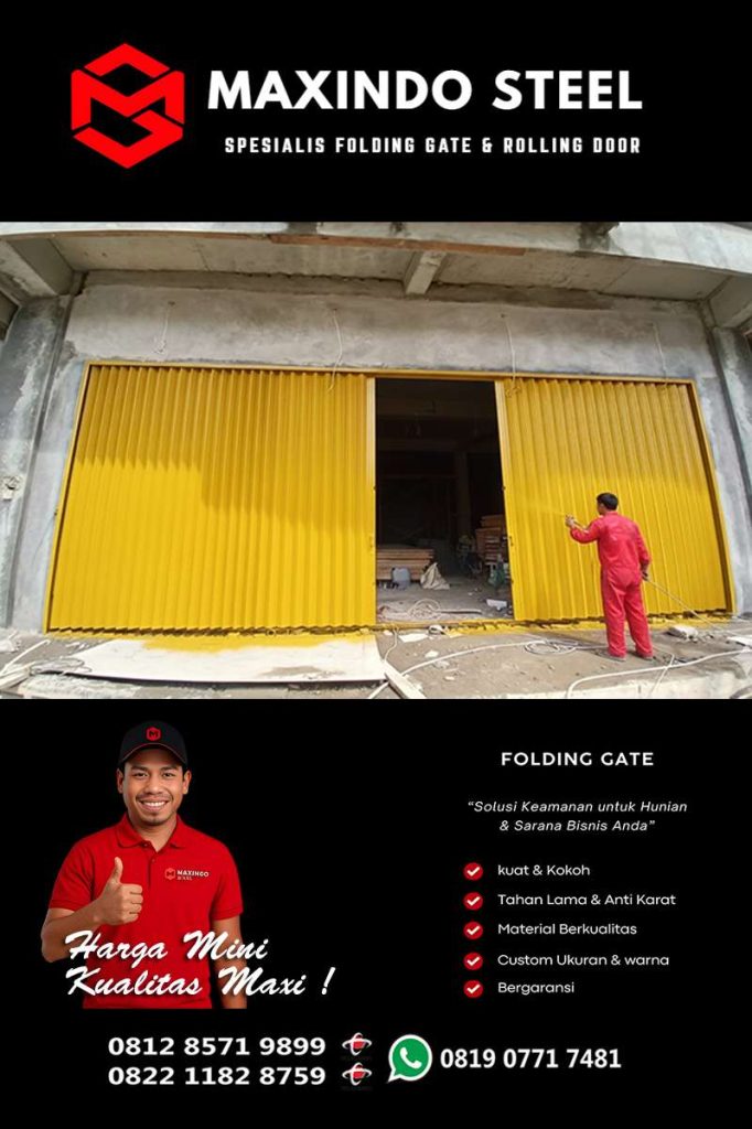 Pemasangan folding gate kuning untuk bangunan besar di Cipinang Besar Utara Jatinegara